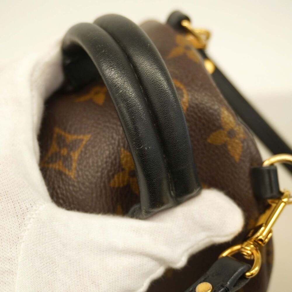 LOUIS VUITTON Brown Monogram Backpack - Picture 12 of 13
